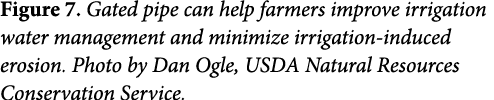Figure 7. Gated pipe can help farmers improve irrigation water management and minimize irrigation-induced erosion. Ph...