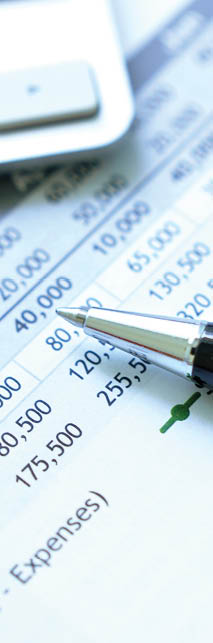 photo of financial statement, calculator, and pen