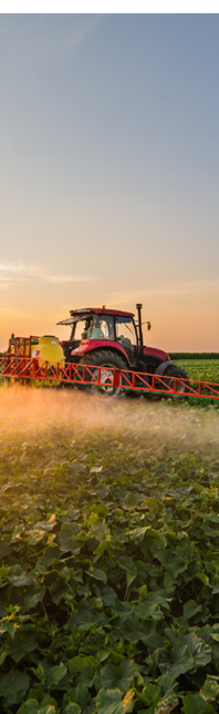 tractor spraying agricultural field